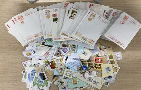 Collection of Used Stamps and Miswritten Postcards